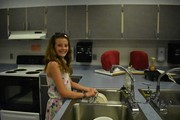 Grace washing dishes